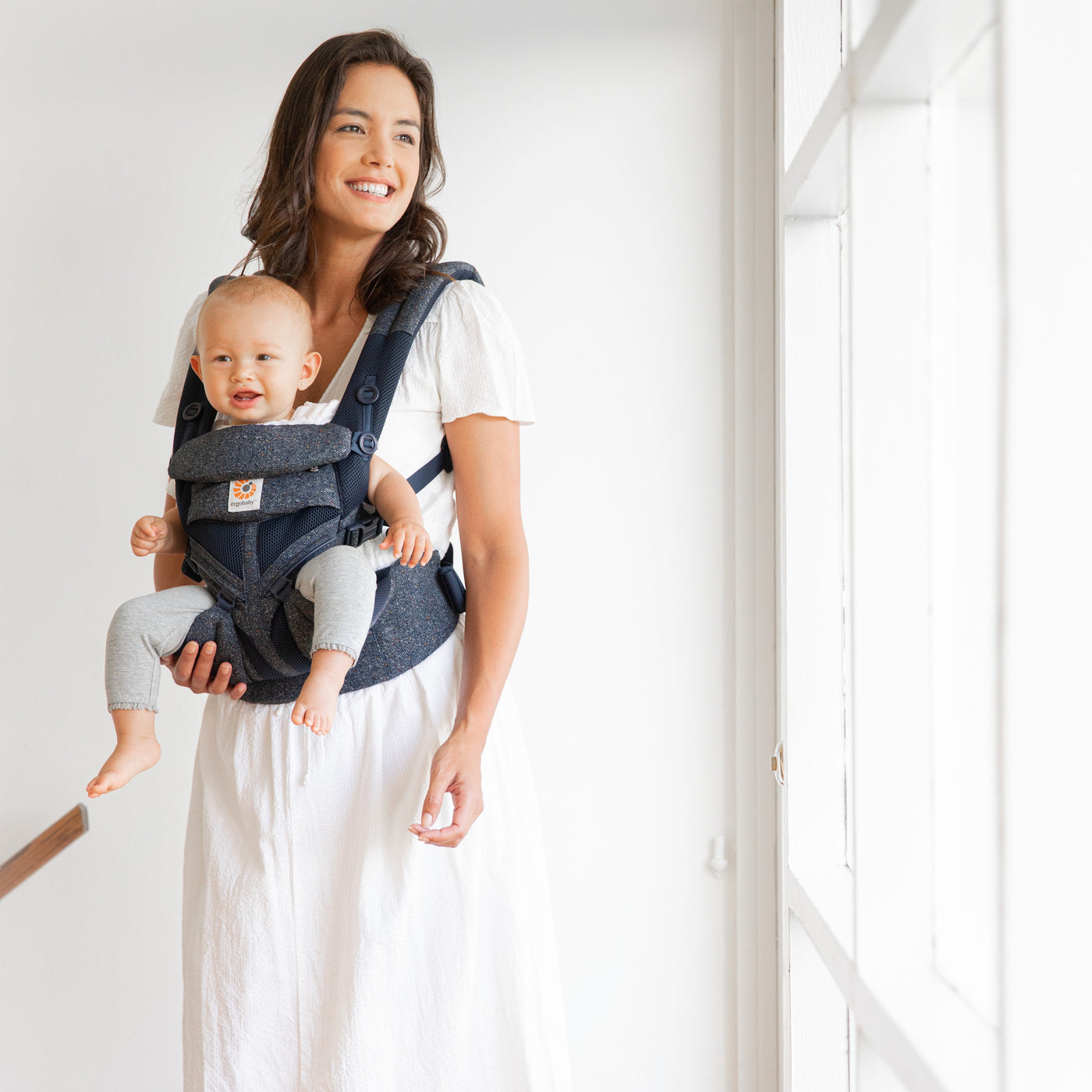Mum with baby in the Ergobaby Omni 360 carrier