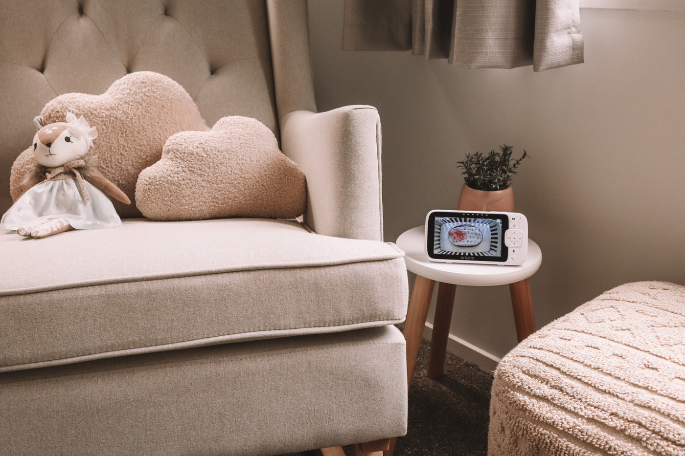 Oricom baby monitor in a lounge on a table